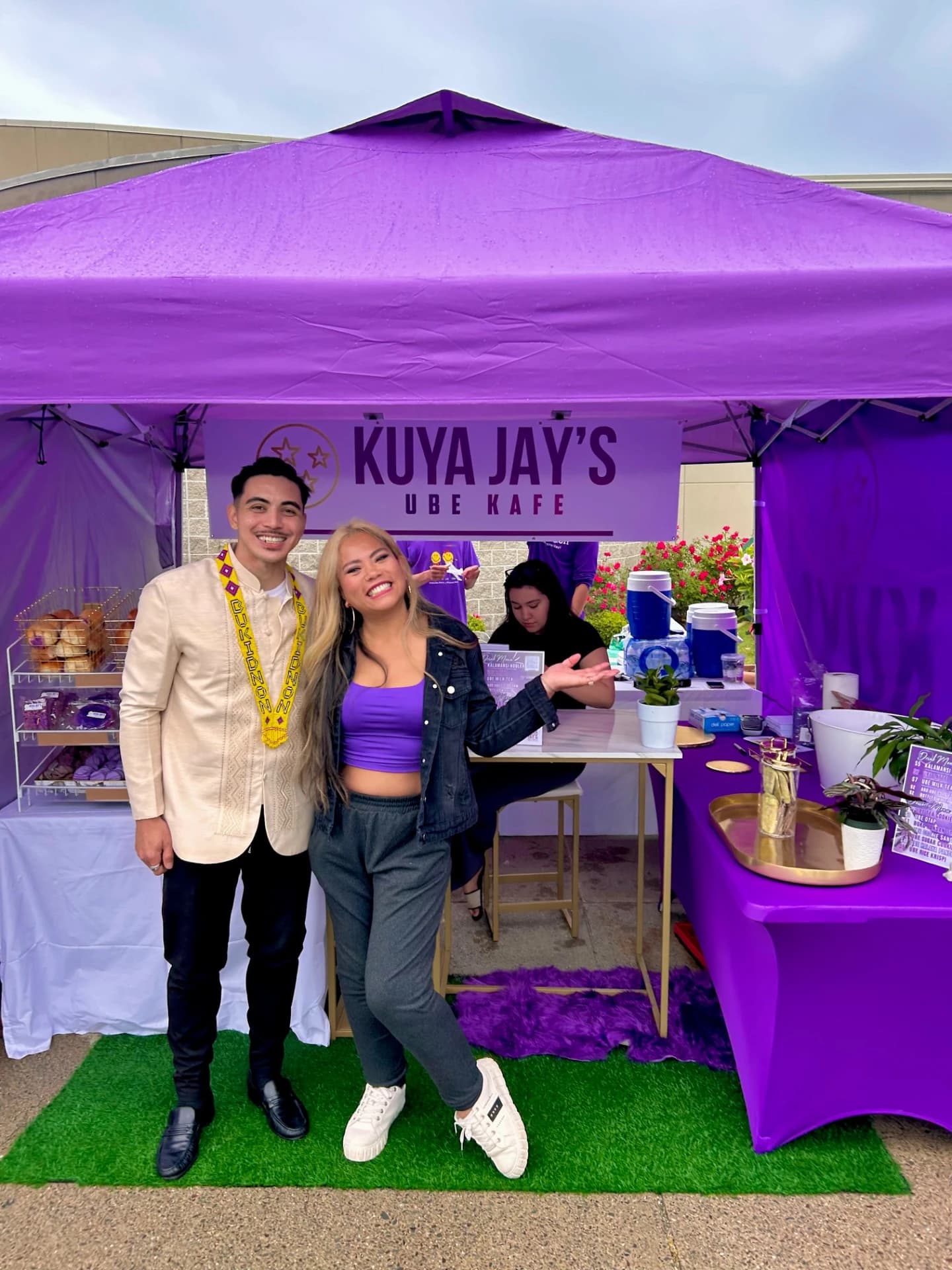Kuya Jay's Ube Kafe pop-up tent with enthusiastic customers